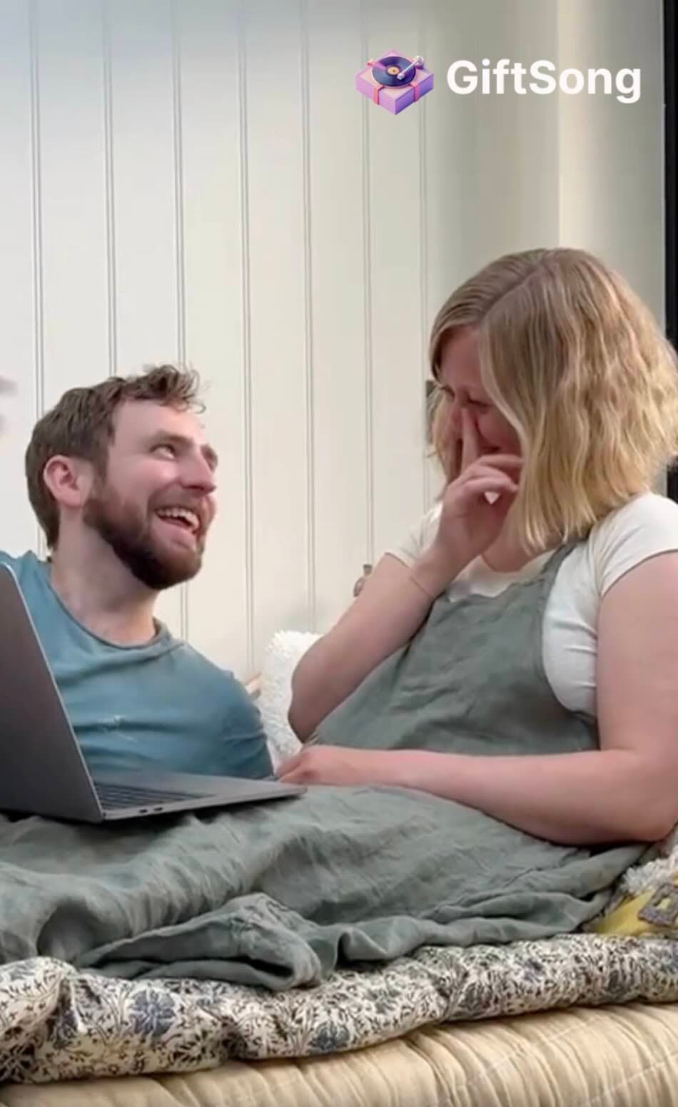 A couple listening together to a personal song on a phone